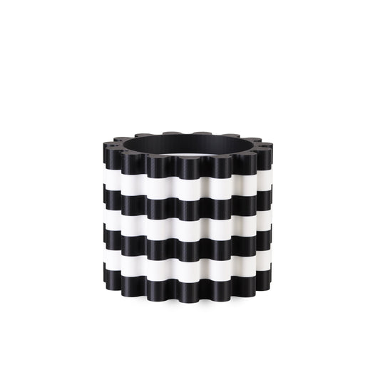 Black and white striped flowerpot on a white background